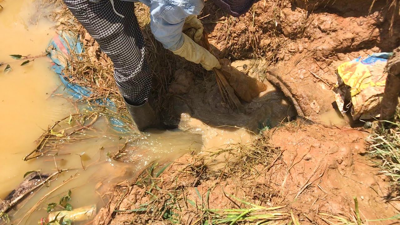 Awesome!! Unclogging Culvert Drain Cleanup Debris In Drain Water - YouTube