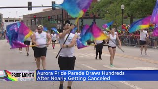 Aurora Pride Parade draws hundreds after near cancellation