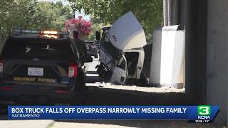 Box truck falls off I-5 overpass, narrowly missing mother and toddlers