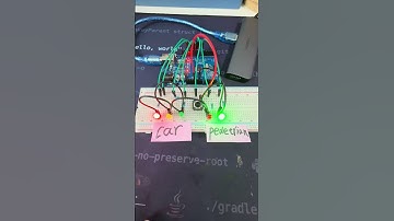 Arduino-based traffic light system with pedestrian button interaction. #arduinoforbeginners #arduino