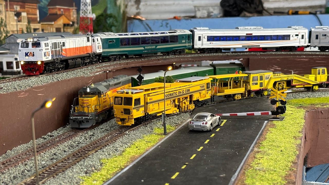 Drama merakit & menjalankan kereta api plasser & theurer & CC206 gerbong panoramic hingga anjlok
