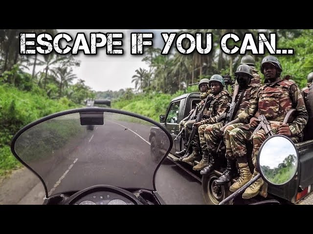 ESCAPE from a COUNTRY at WAR  | Motorcycle World Tour | Africa #51 class=