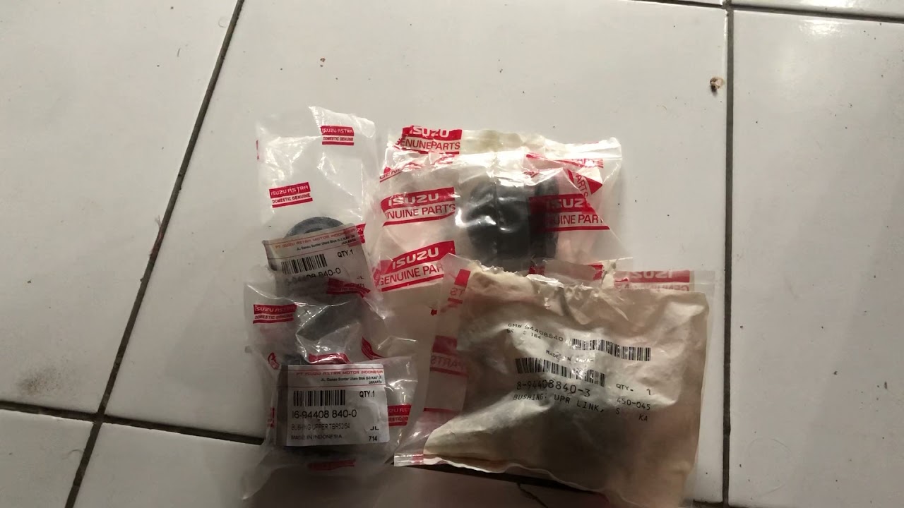 Perbedaan bushing arm atas panther ori isuzu japan dan ori isuzu Indonesia