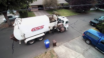 Gresham Sanitary Services Volvo McNeilus Century Series Autoreach Automated Side Loader