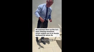 Robert F Kennedy calmly wrangles a snake in unexpected wildlife moment