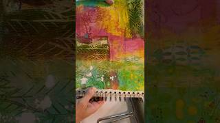 Pulling a print. Printing in my sketchbook with the gelli plate.