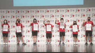 五輪開会式先導役を激励 日本コカ、7人に任命状