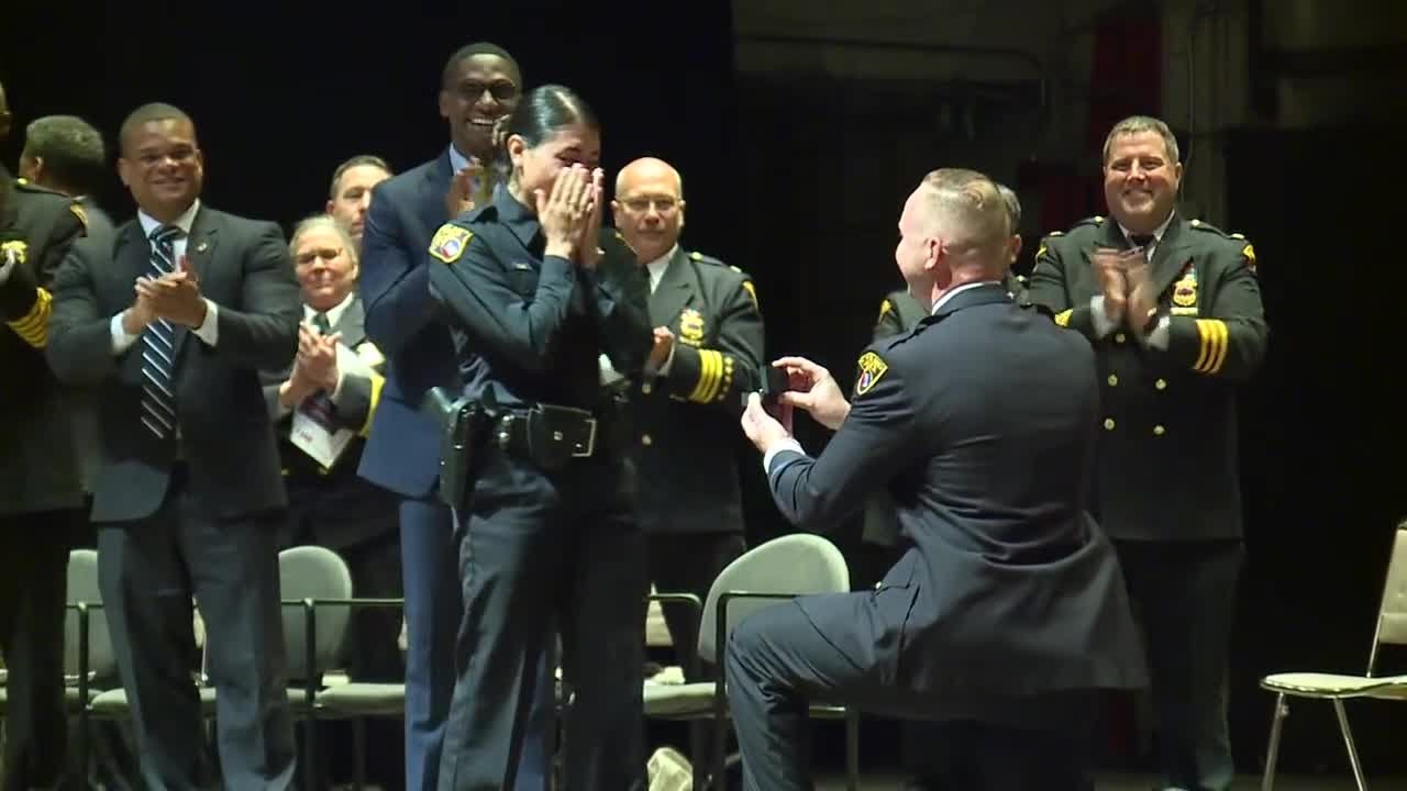 She said yes! Officer proposes at Cleveland PD graduation ceremony