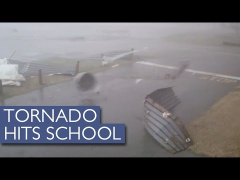 Incredible CCTV footage of a 95mph tornado hitting school
