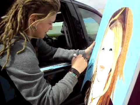 A3 Crystal Bowersox autographs my portrait of her.