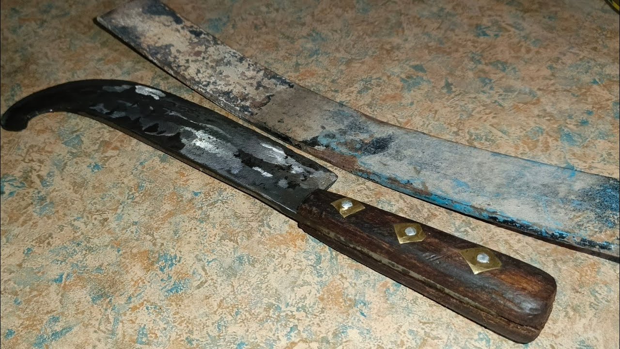 Forging butcher's knife out of rusted leaf spring. 