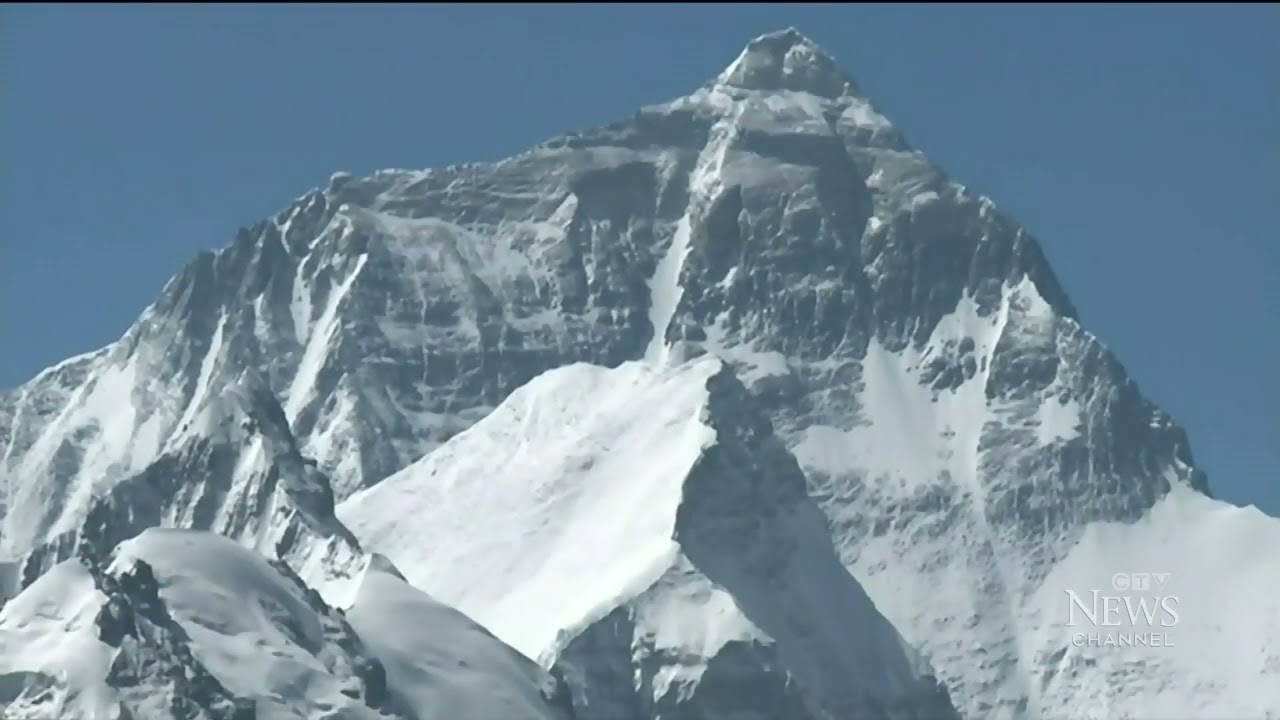 Double amputee makes history climbing Mount Everest