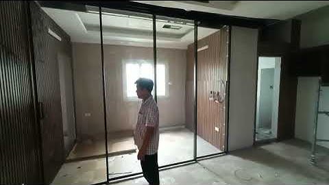 Nghiệm thu công trình thực tế vách lùa cánh kính không ray dưới do Boloni thi công