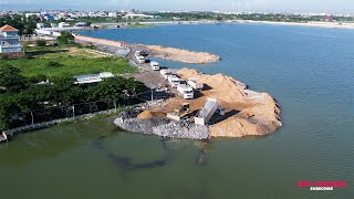 Transporting Stone in Dump Trucks to Create a Road in the Middle of a Lake with Bulldozer Moving!