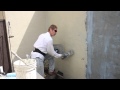 How to apply new stucco over a painted surface