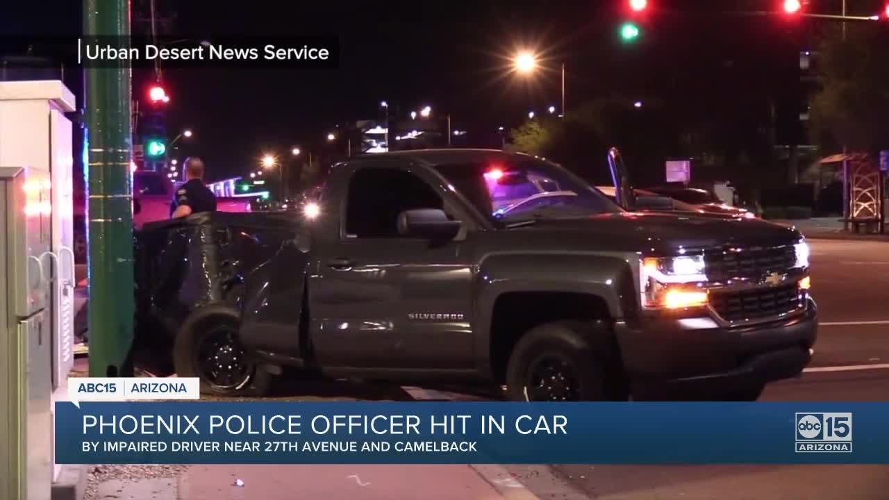 Phoenix officer hospitalized after being hit by DUI suspect - YouTube