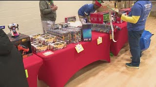 Students redeem good behavior, schoolwork points to get gifts for family members this holiday season