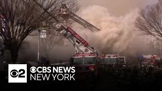 5-alarm fire tears through a row of businesses in the Morris Heights section of the Bronx