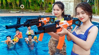 VTL Nerf War: Captain SEAL IRON HAND Warrior Nerf Guns Fight Criminal Tranbi Rescue Sister at Pool