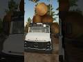 Carregando O MB 2217 Com Toras De Madeira - FS22