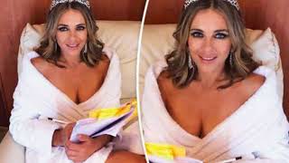 Celebrity Elizabeth Hurley 52 flashes major cleavage as she appears NAKED under white robe Profile