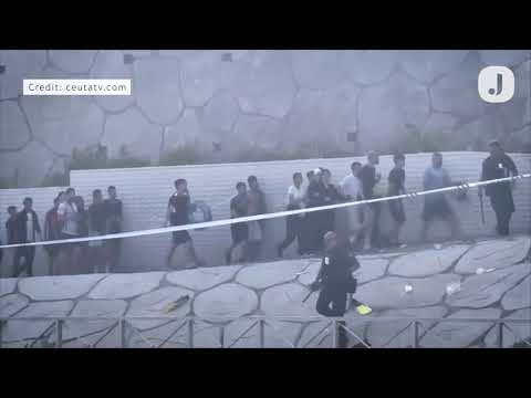 Spain to deploy extra troops to ceuta as thousands enter enclave From Morocco