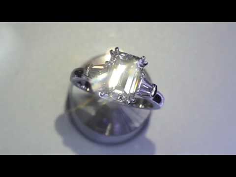 tiffany-&-co-signature-emerald-cut-diamond-engagement-ring-set-in-platinum-with-tapered-baguettes