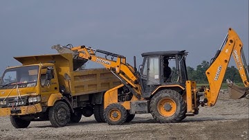 Escort machine loading Gravel in dump truck- Truck carry Gravel in river