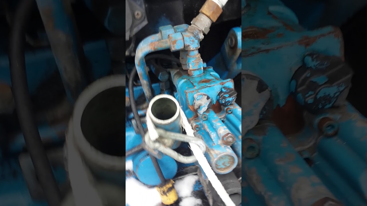 How to top up a Ford 7740 with hydraulic oil YouTube