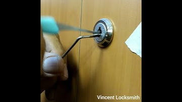 Unlocking cabinet cam lock