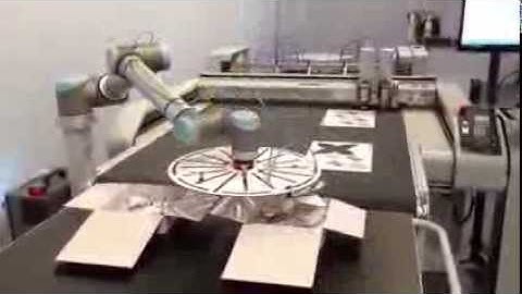 Auto material handling with UR robot (folding carton)