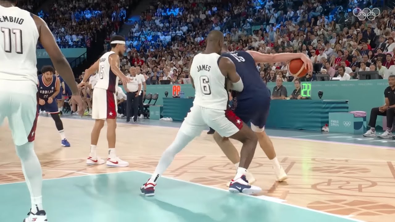 LeBron James guarding Nikola Jokic in the 4th quarter of the 2024 Olympics Semifinals