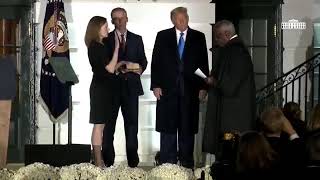 Justice Clarence Thomas administers the oath of office for Justice Amy Coney Barrett