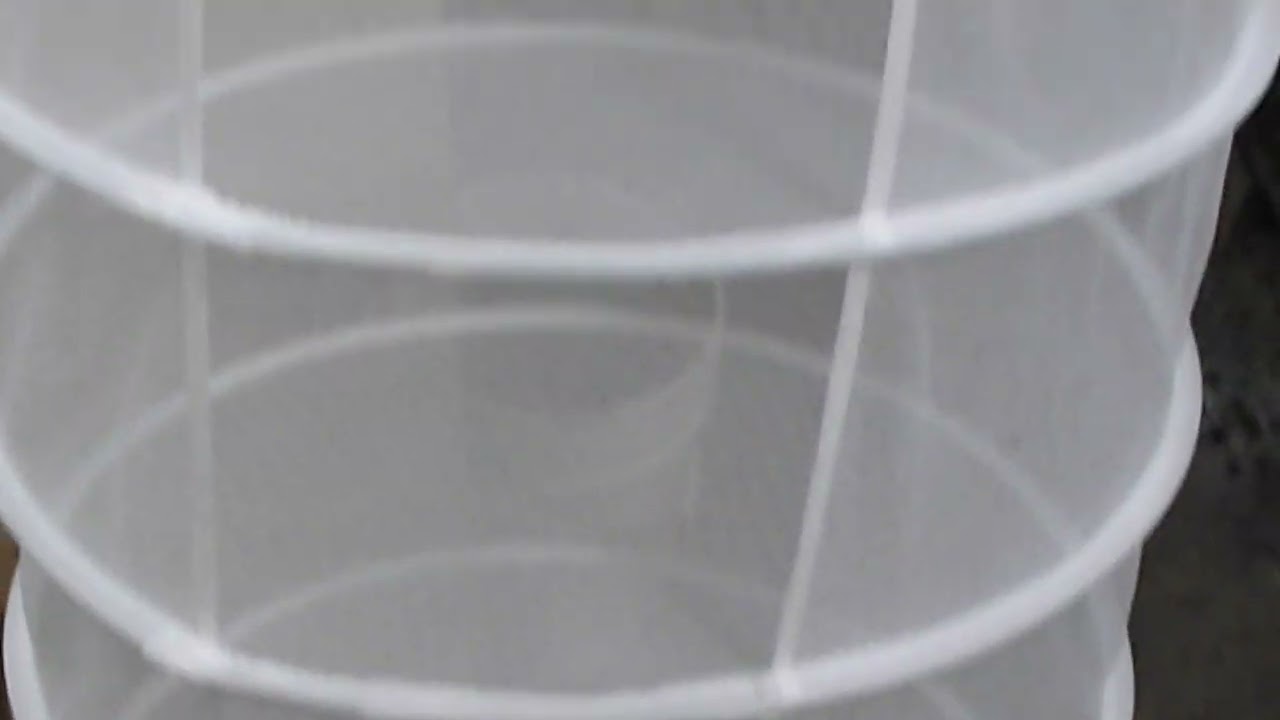 The Viagrow collapsible herb drying rack. Lightweight white netting. 8 levels to dry in. About 5 ft.