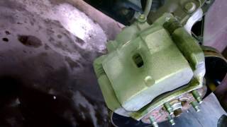 Front brake pad replacement 2006 Chevrolet HHR Install Remove Replace rotor