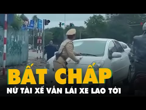 Video Bất chấp cảnh sát giao thông 'lấy người chặn xe', nữ... - youtube