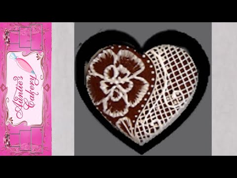 Chocolate Sugar cookie with brush embroidery and royal icing lace.