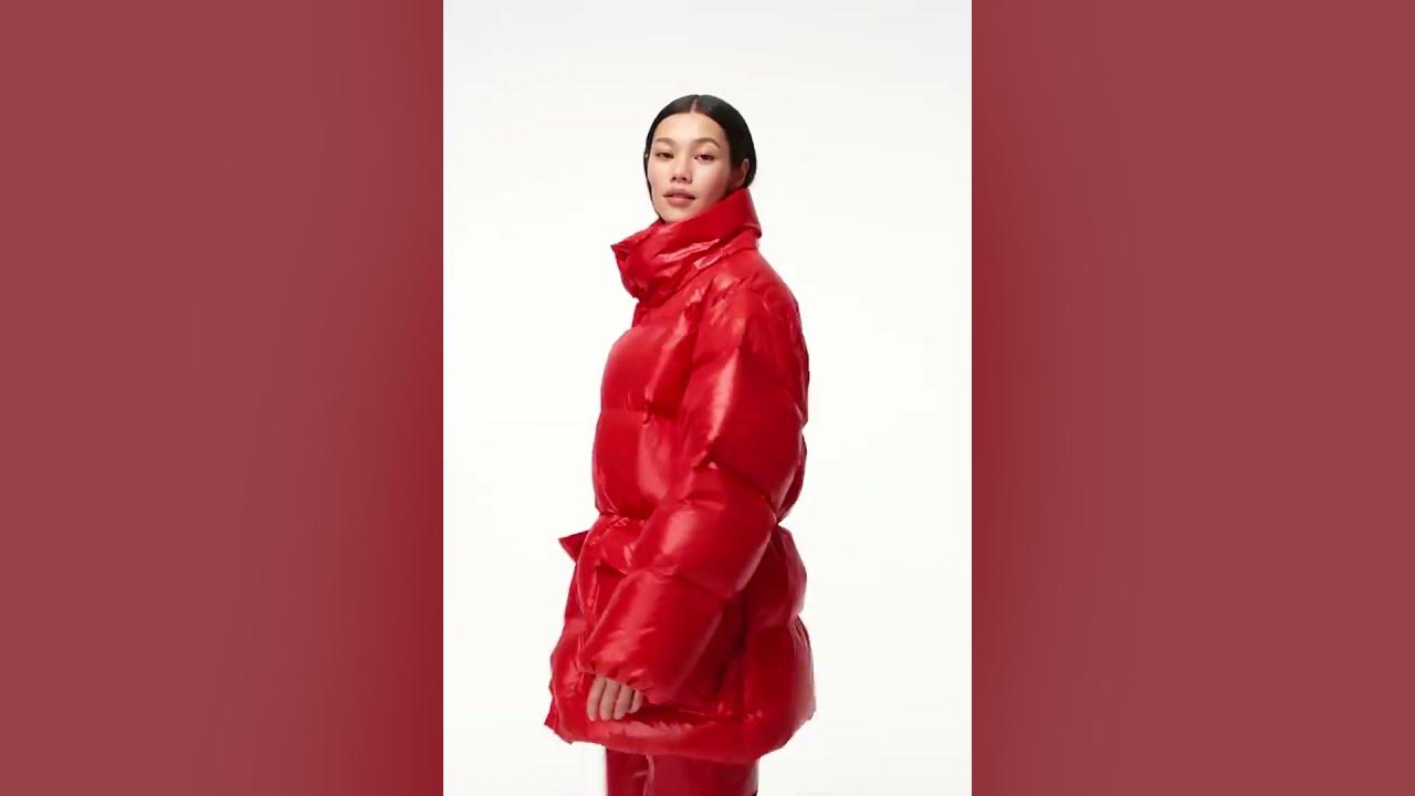 Red modern branded down jacket, puffy down voluminous jacket. Red