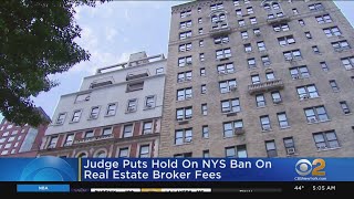 Judge Puts Hold On Broker Fee Ban