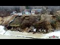 Falling in st joseph mi lakefront home falling in as massive waves wash it away 4k drone footage