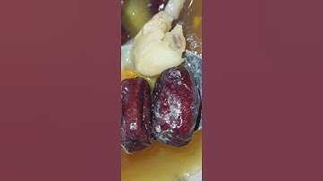 Home cooked chicken soup with dried red dates, Longans and Goji Berries