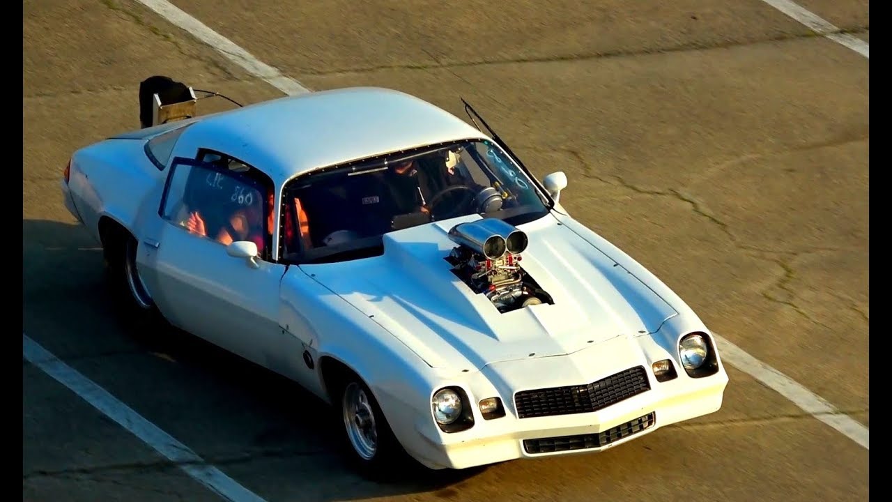 Supercharged Old school american muscle cars drag racing action 1/4 ...