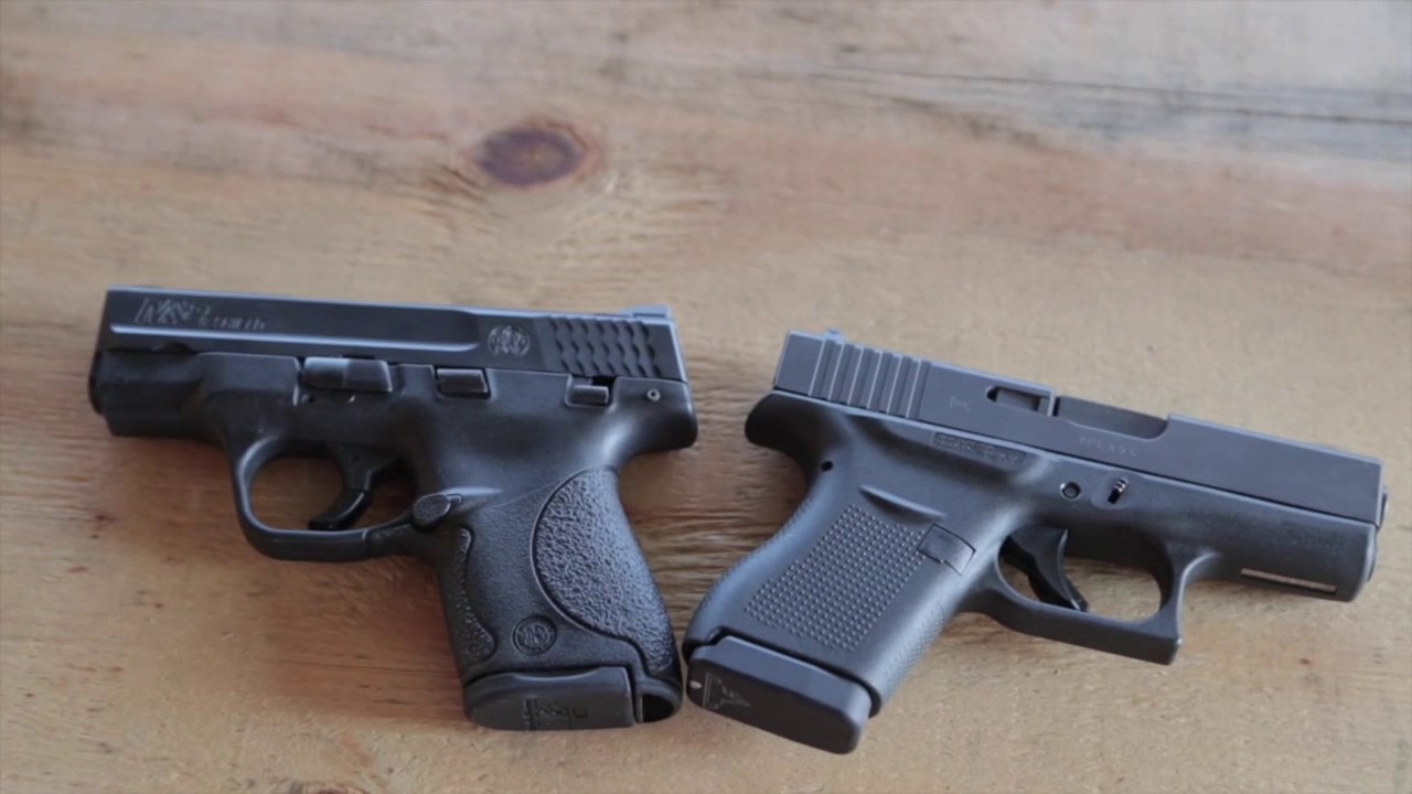 Glock 43 Vs Smith And Wesson M P Shield 9mm YouTube glock-43-vs-smith-and-wesson-m-p-shield-9mm-youtube
