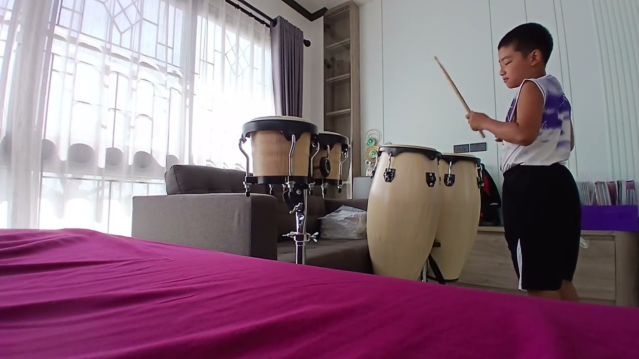 ตีกลองทอม