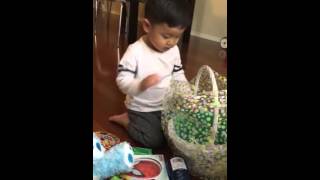 Landon opening Easter Basket from Gma