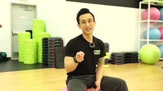 How To Do Ab Rollouts with a Yoga Ball - Personal Trainer Tip Tuesday | Fitness World