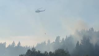 Fire Fighting Helicopters Putting Out a Local Fire