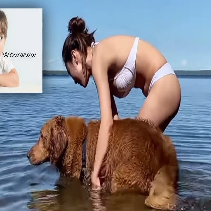 wanita cantik mandi bareng anjing