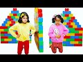 Ashu mess up pretend play with Katy Cutie jumbo blocks wall