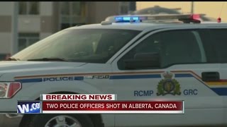 Gunman opens fire on 2 Canadian Police Officers